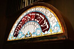 stained glass window with hebrew